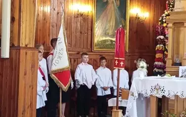 W kościele.
